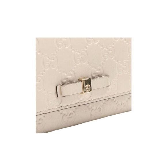 GUCCI Guccisima White Calfskin
Leather Bow Wallet Full Inclusion - Picture 10 of 13
